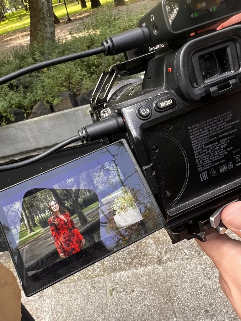 Sahra-Josephine on a camera screen during an outdoor shoot